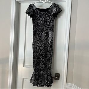 NWT Large, black and white FUZZI dress. Midi length. Great stretch material